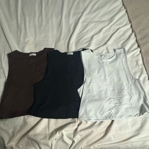 3 Babaton contour muscle tanks!